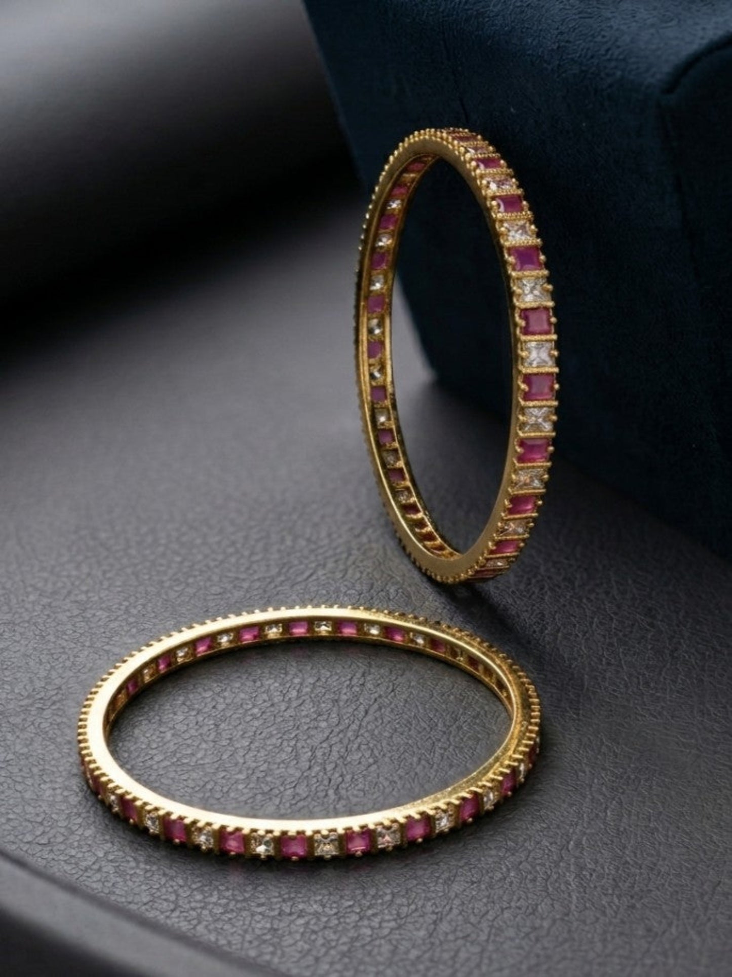 A pair Of Ruby AD Stone Bangles