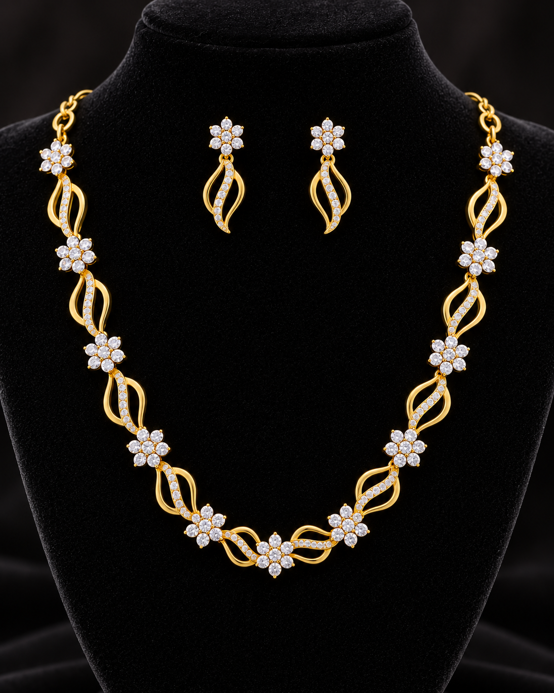 Elegant gold and stone replica necklace set with matching drop earrings for festive and party wear.