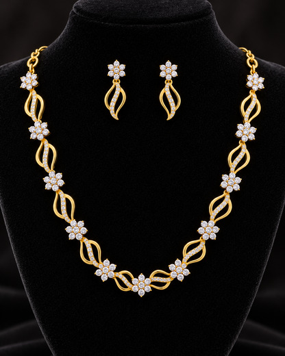 Elegant gold and stone replica necklace set with matching drop earrings for festive and party wear.