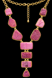 Full view of the raw pink agate Y-shaped statement necklace on white