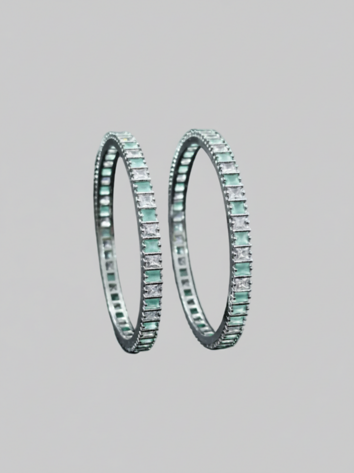 "Modern Mint Green AD Stone Bangles in a vertical luxury portrait crop - GemofU"