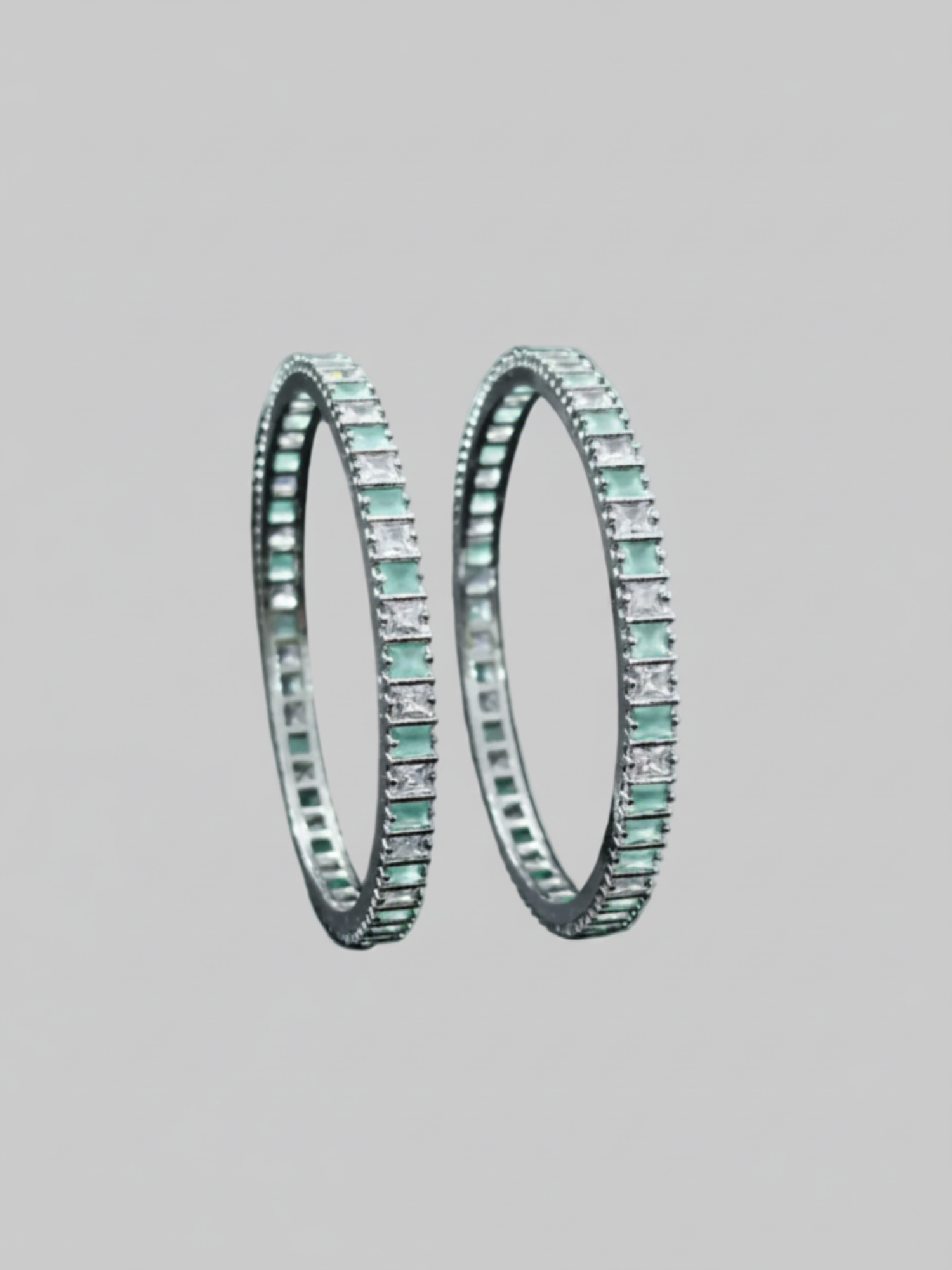 "Modern Mint Green AD Stone Bangles in a vertical luxury portrait crop - GemofU"